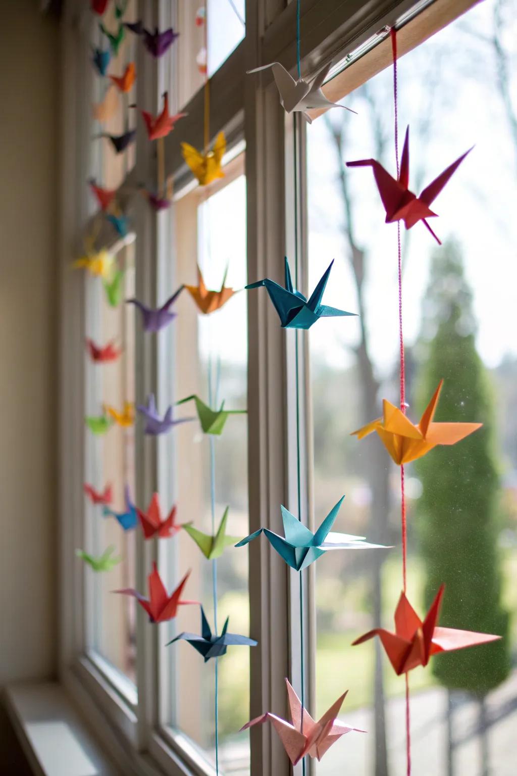 Origami cranes dancing in the sunlight.