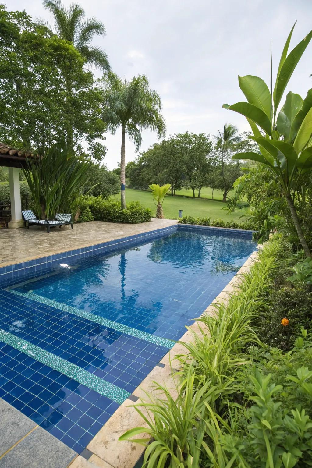 Azure-tinted tiles provide an evergreen and ageless appearance to any pool setting.