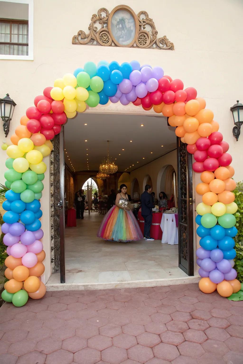 A grand balloon arch welcomes guests to the quinceanera.