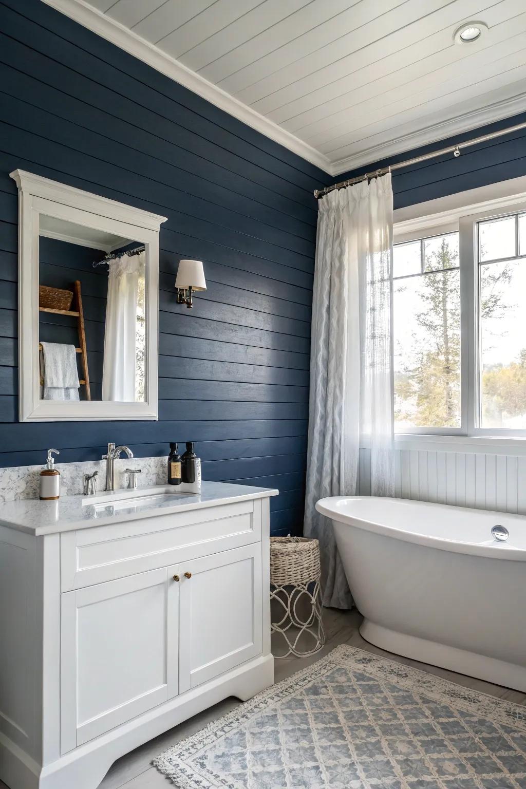 A bathroom with dark blue shiplap for a bold statement.