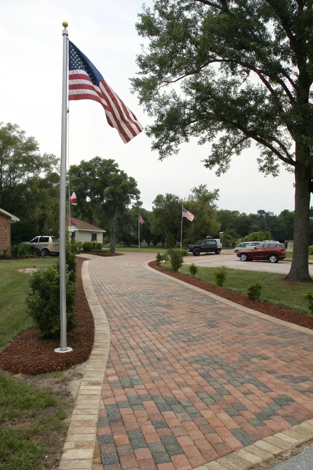 A flag lot driveway creatively constructed with recycled bricks and pavers.