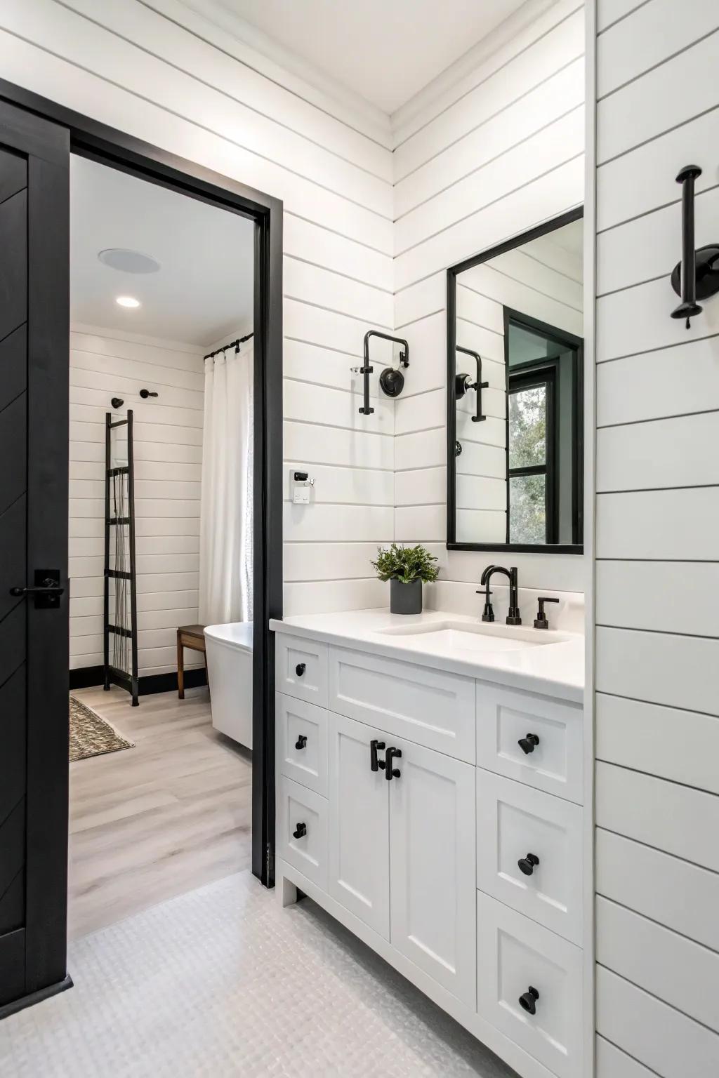 A monochrome bathroom with white shiplap for a textured look.