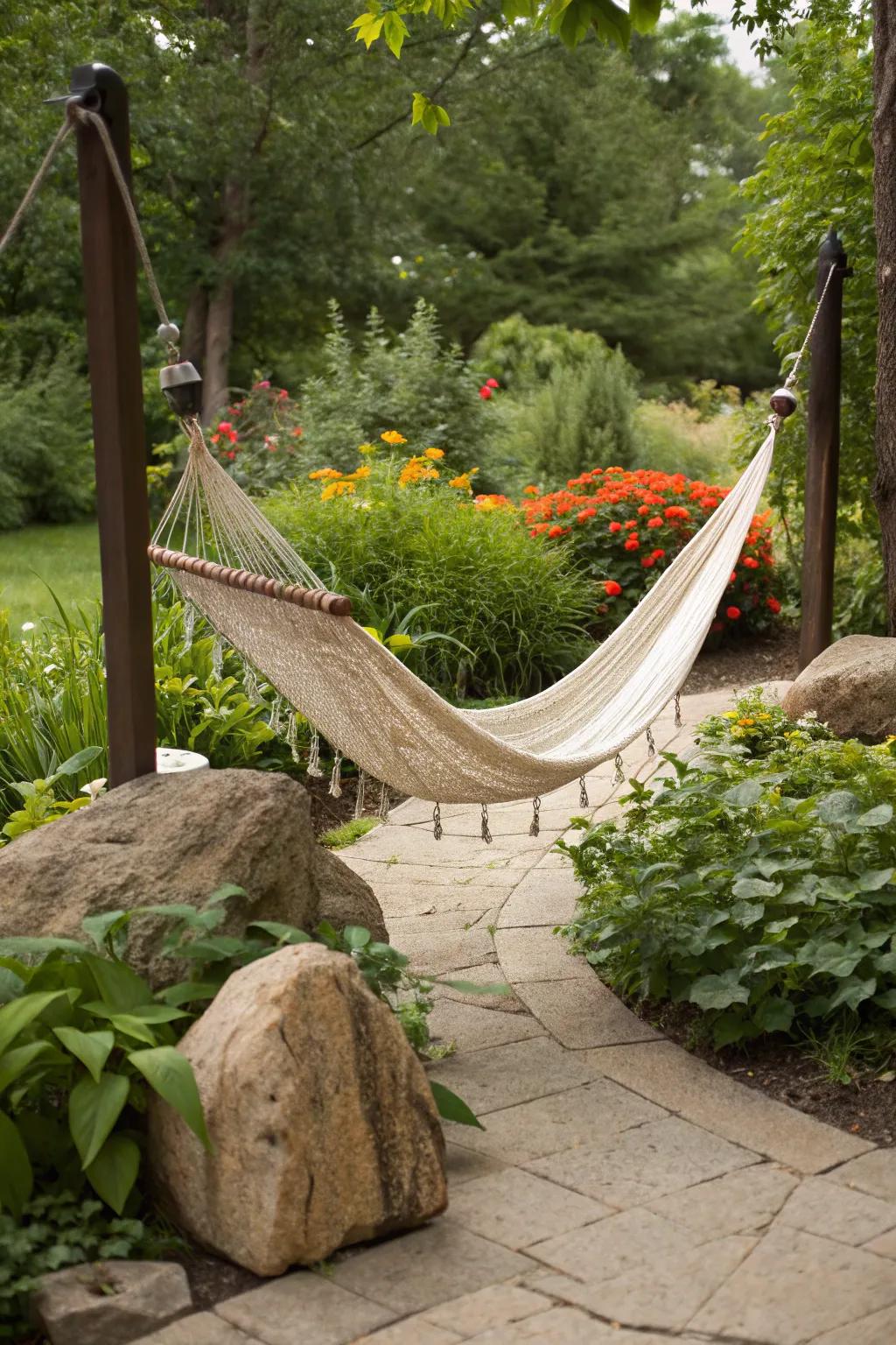 A cozy hammock supported by sturdy rock anchors in a garden.