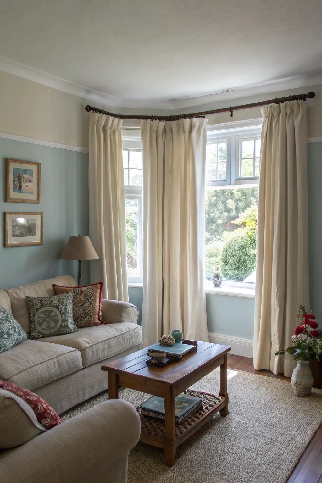 High-hung curtains add verticality to this small living room.