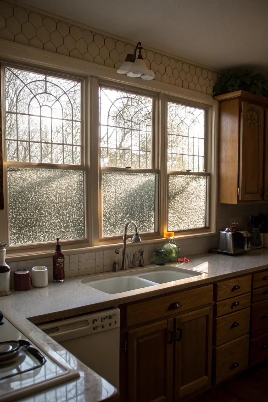 A kitchen featuring textured glass windows, providing privacy and light.