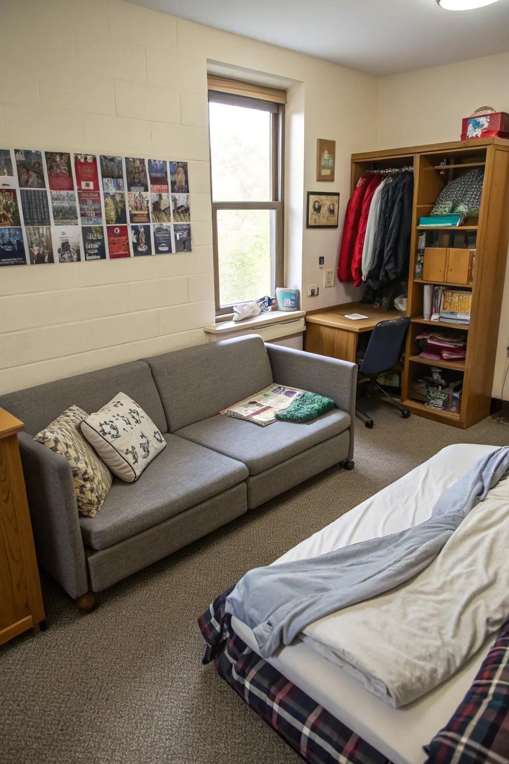 A folding sofa offers versatility in this adaptable dorm room setup.