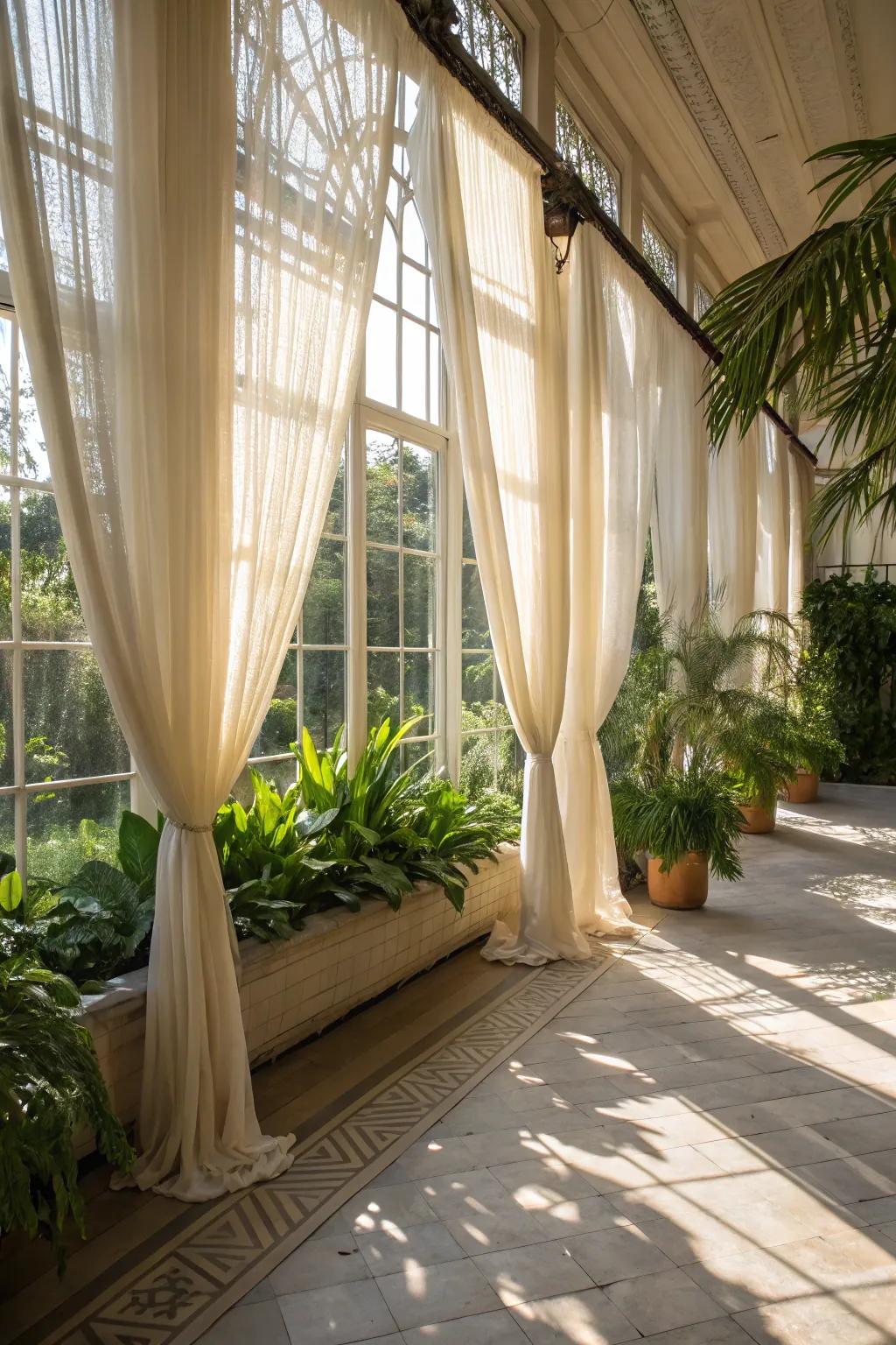 Sheer curtains enhancing the light and airy feel of a conservatory.