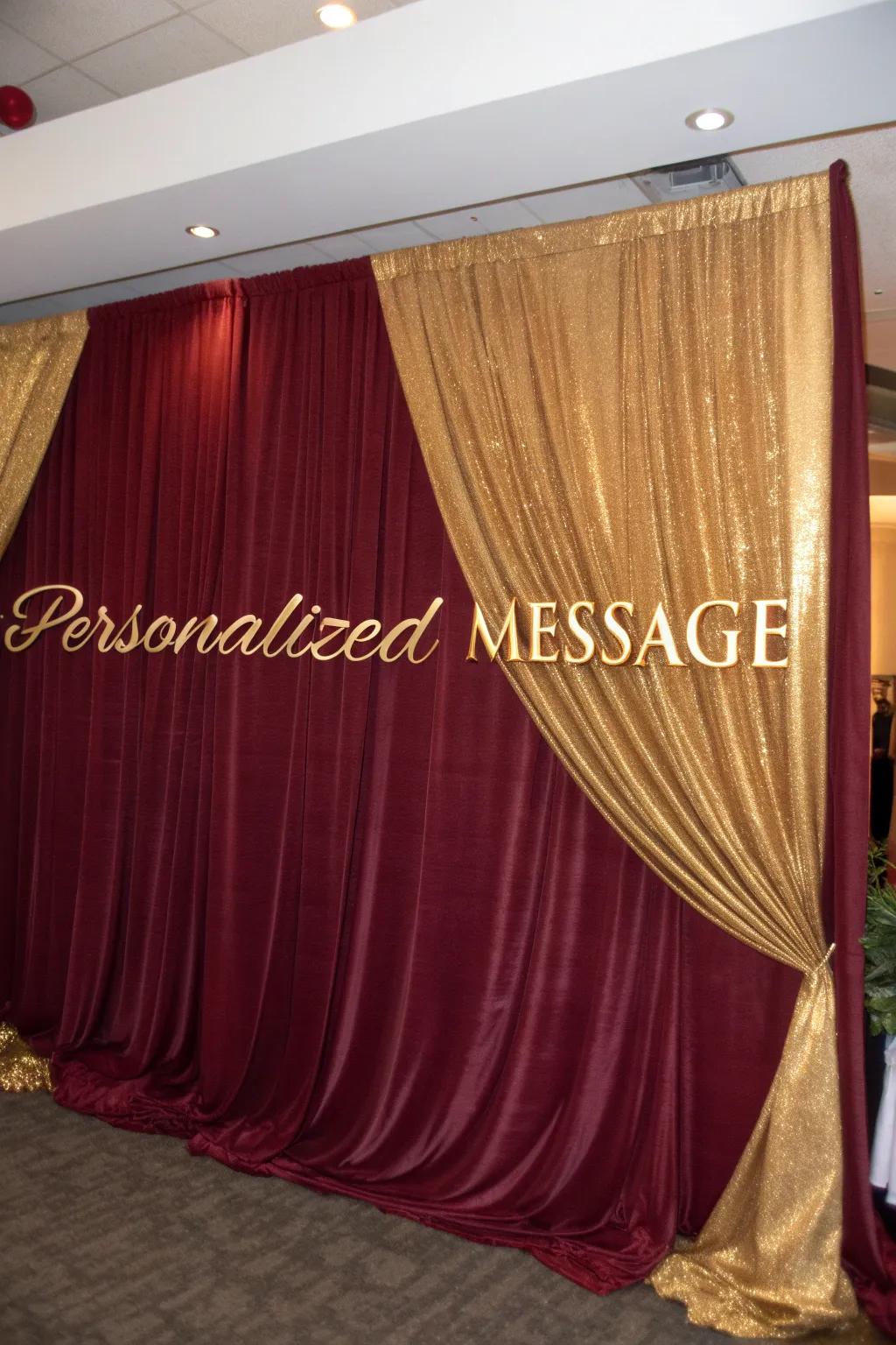 Fashion an attention-grabbing show utilizing opulent wine and glimmer textile hangings.