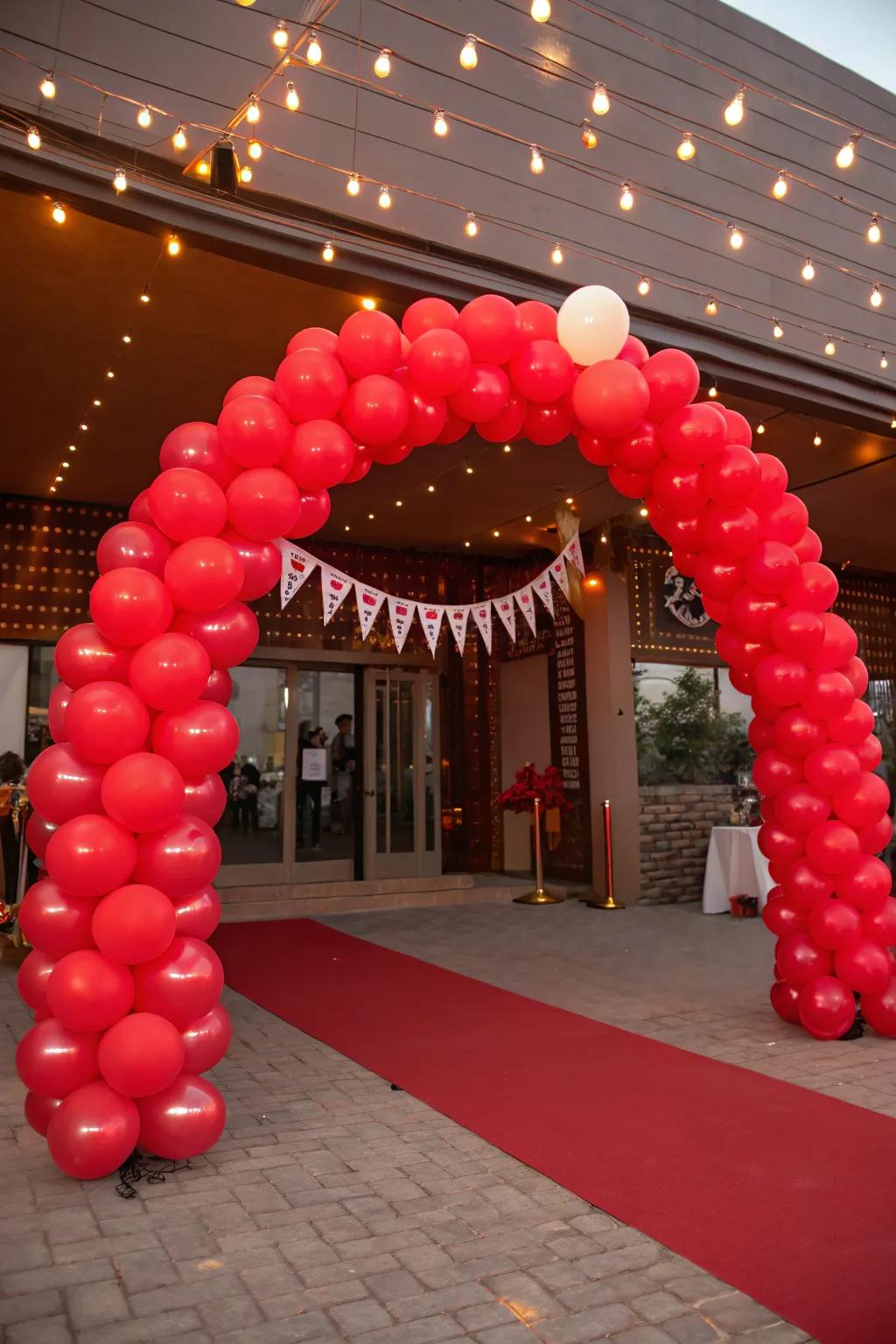 A crimson balloon arch making a grand entrance statement.