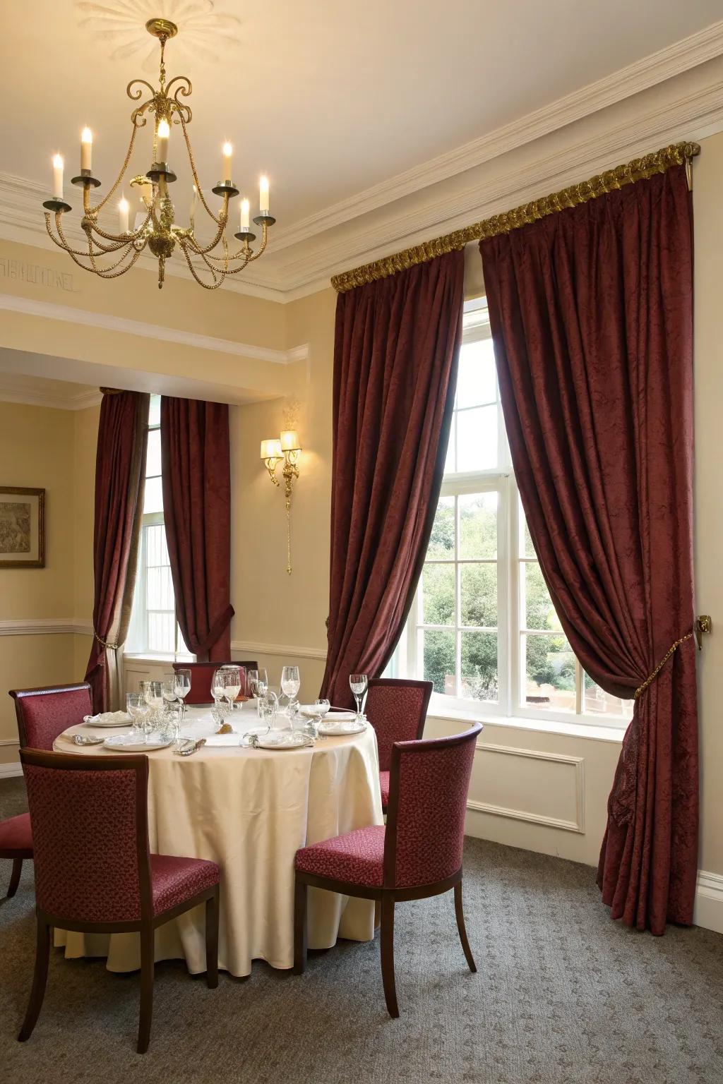 Sophisticated drapes adding drama to a dining room.