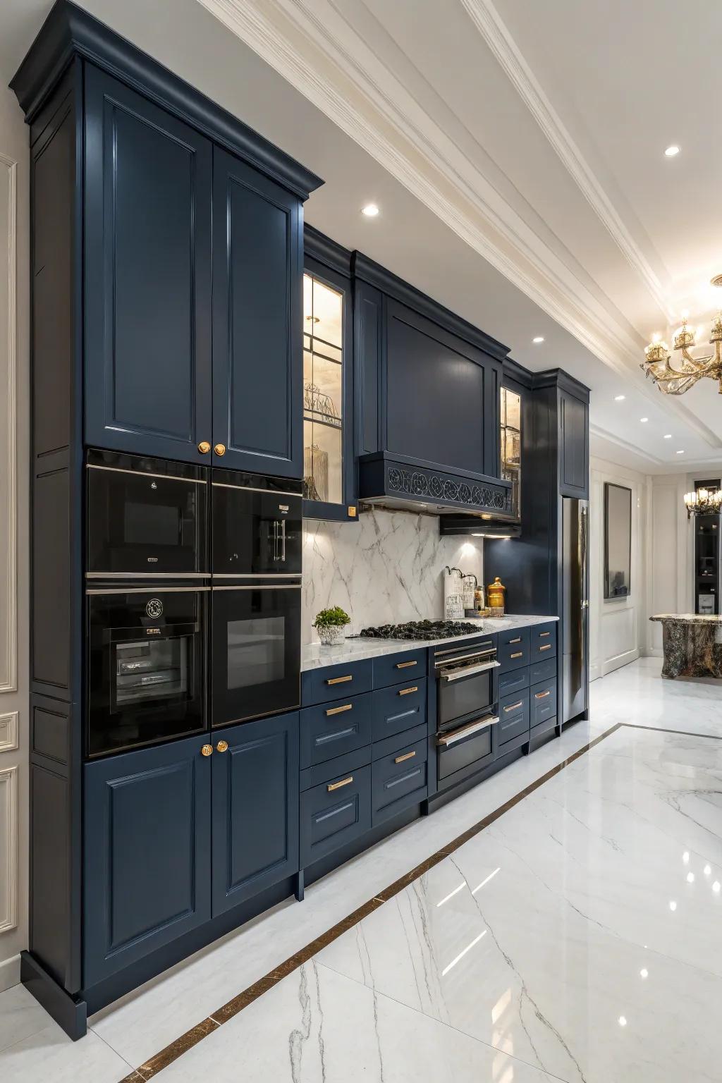 Blue cabinets add a dramatic flair to sleek black appliances.