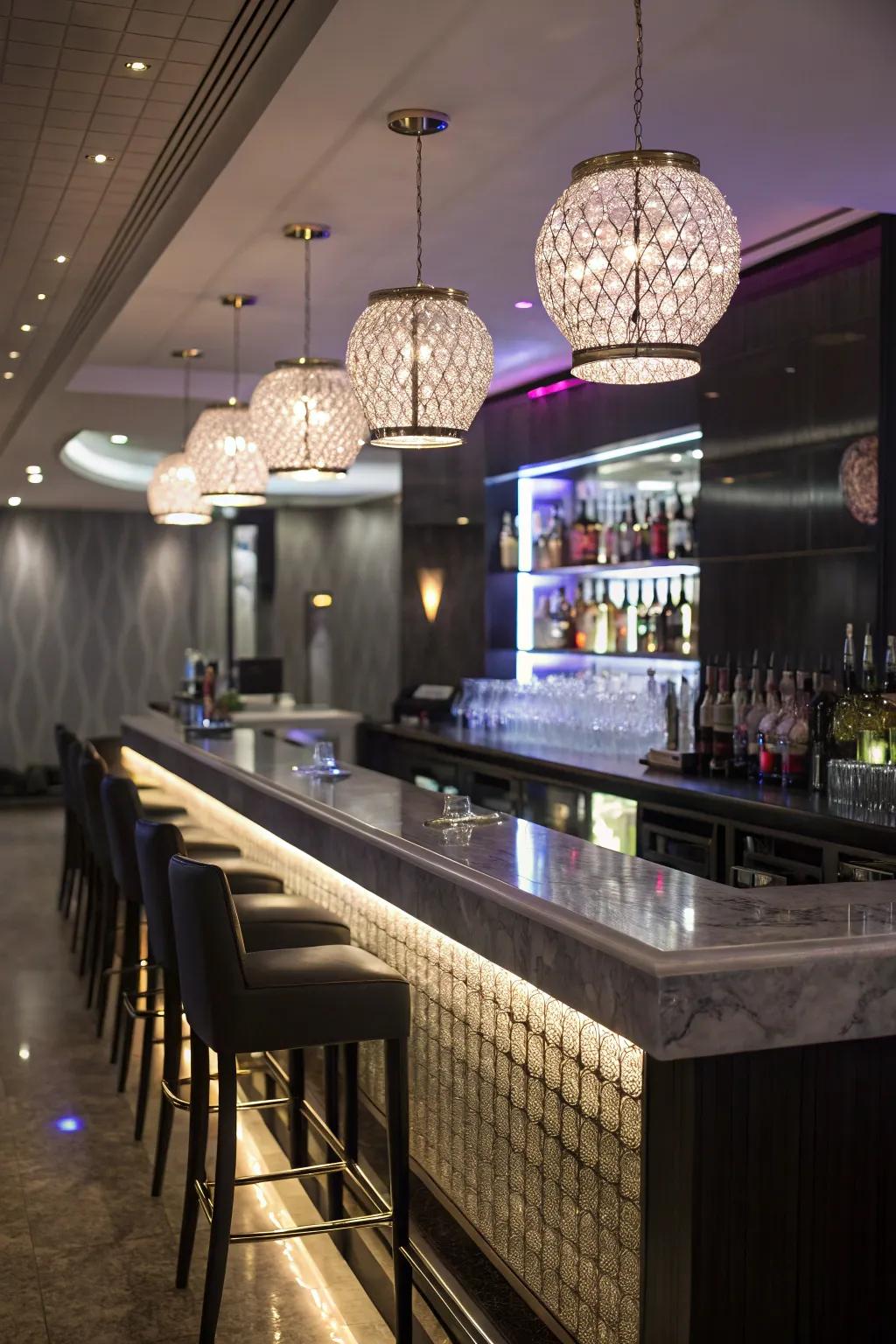 Eye-catching statement lighting fixtures in a small wet bar.