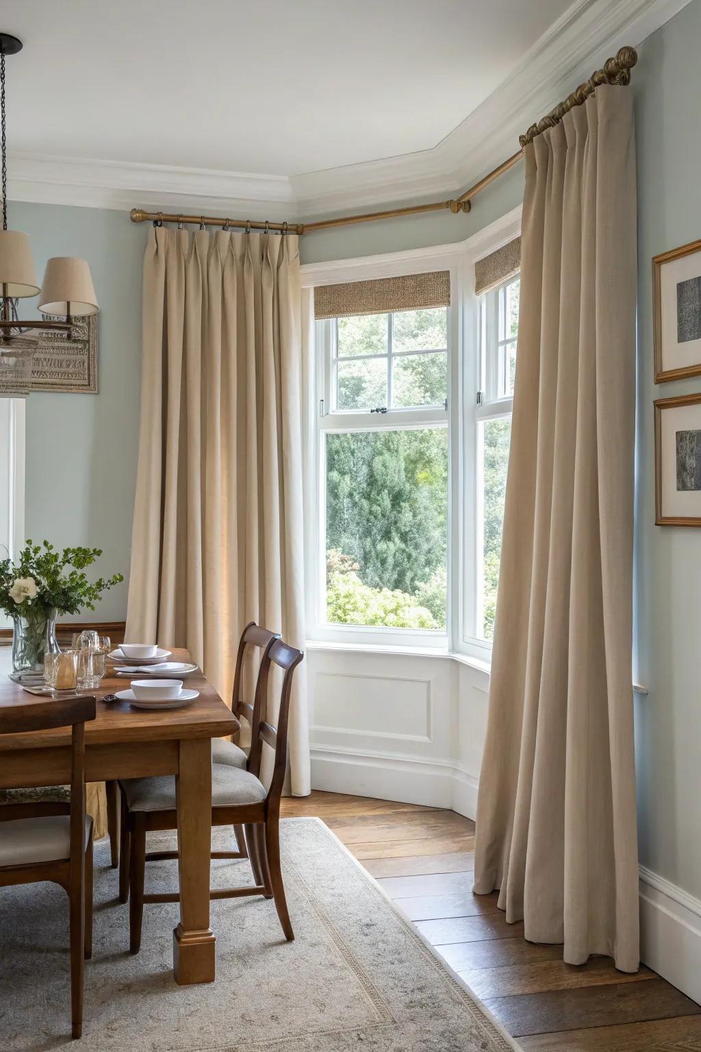 Neutral curtains complementing diverse dining room styles.