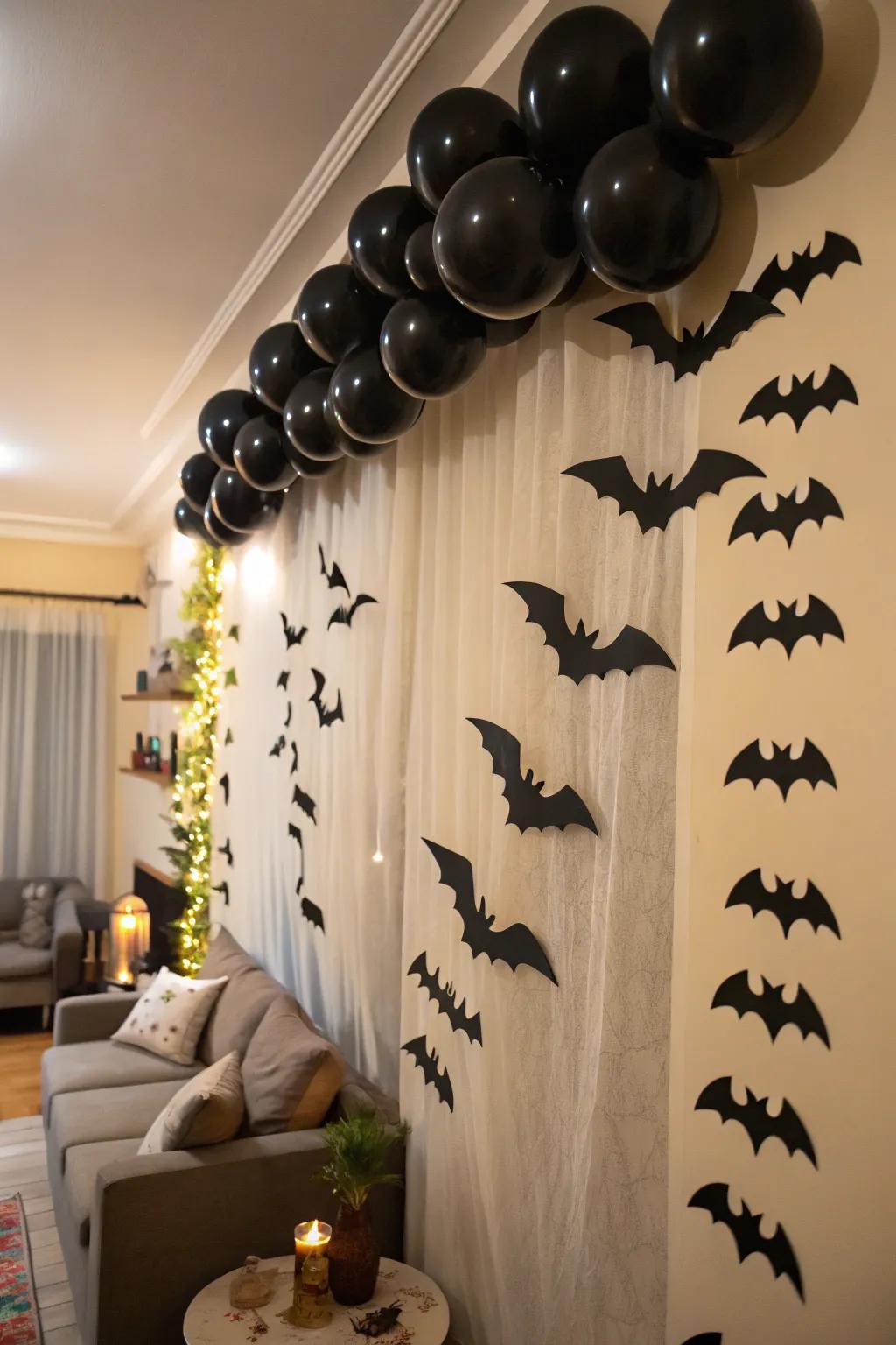 A festoon of dark inflatables and cardboard bats introduces playful drama