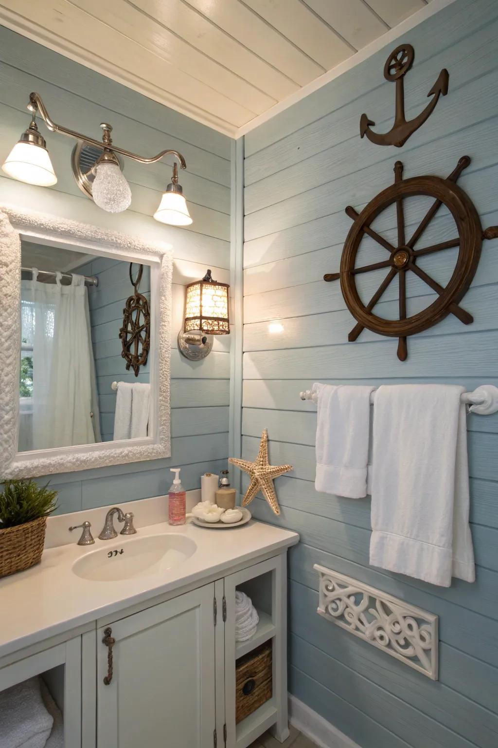 A bathroom with soft blue shiplap walls and nautical decor.