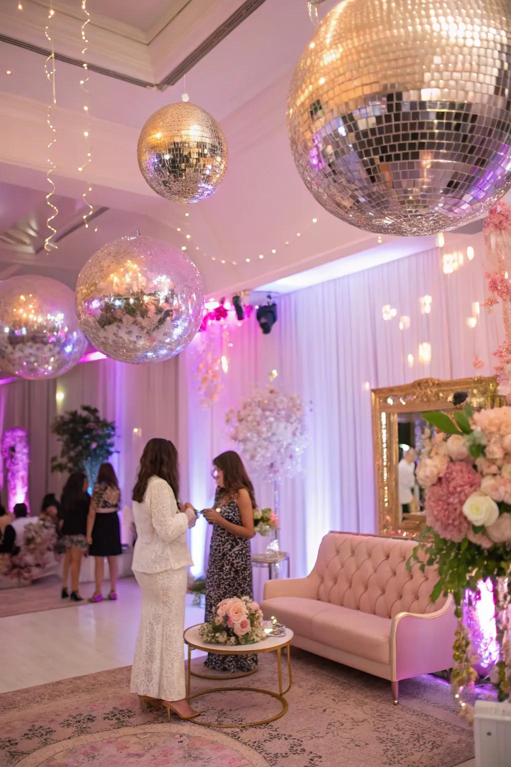 Disco balls add a glamorous touch to the celebration.