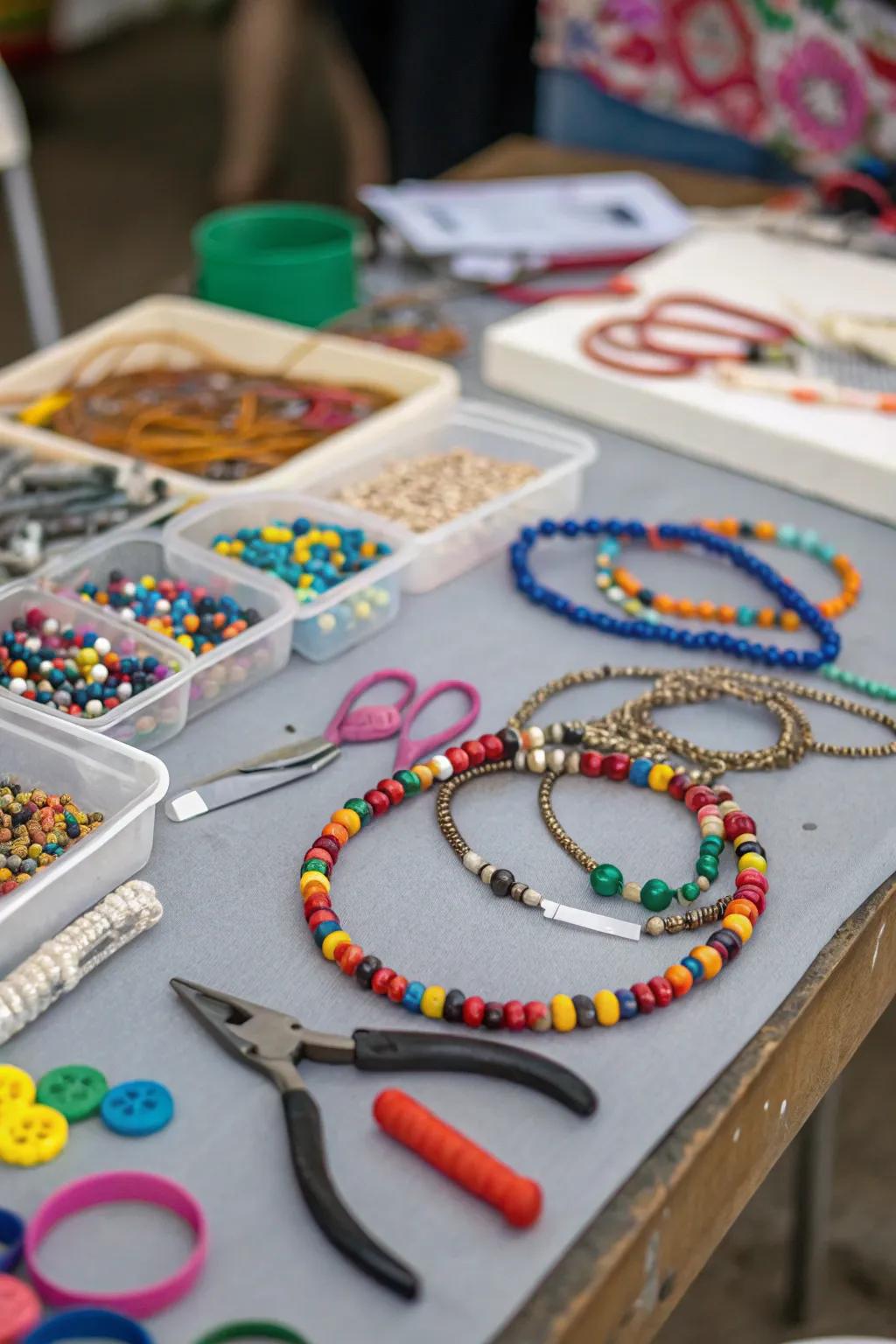 A bead-making station offers guests a creative outlet and a party memento