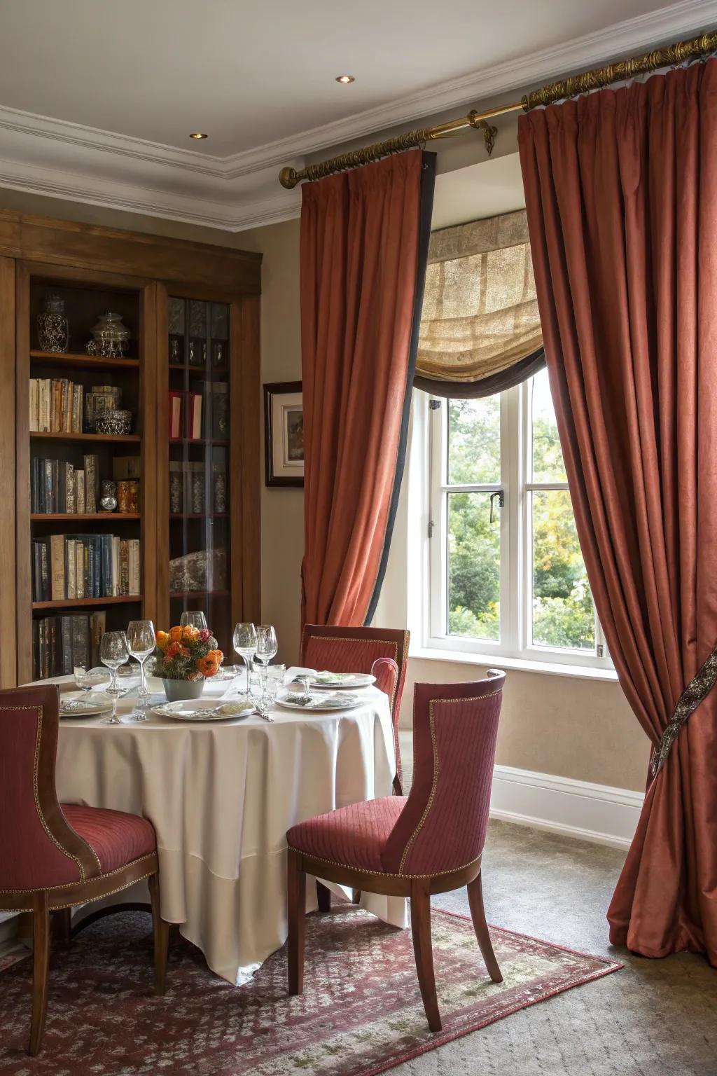 Stylish drapery brings drama and elegance to a small dining space.