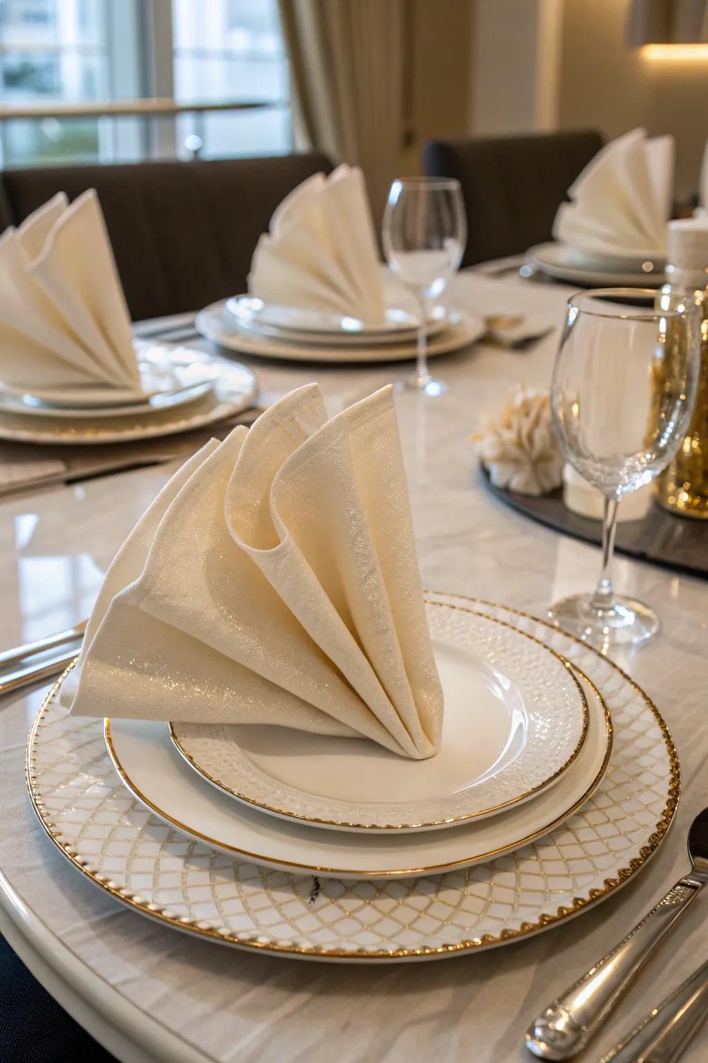 An elegant touch is achieved with elegant napkin folds.