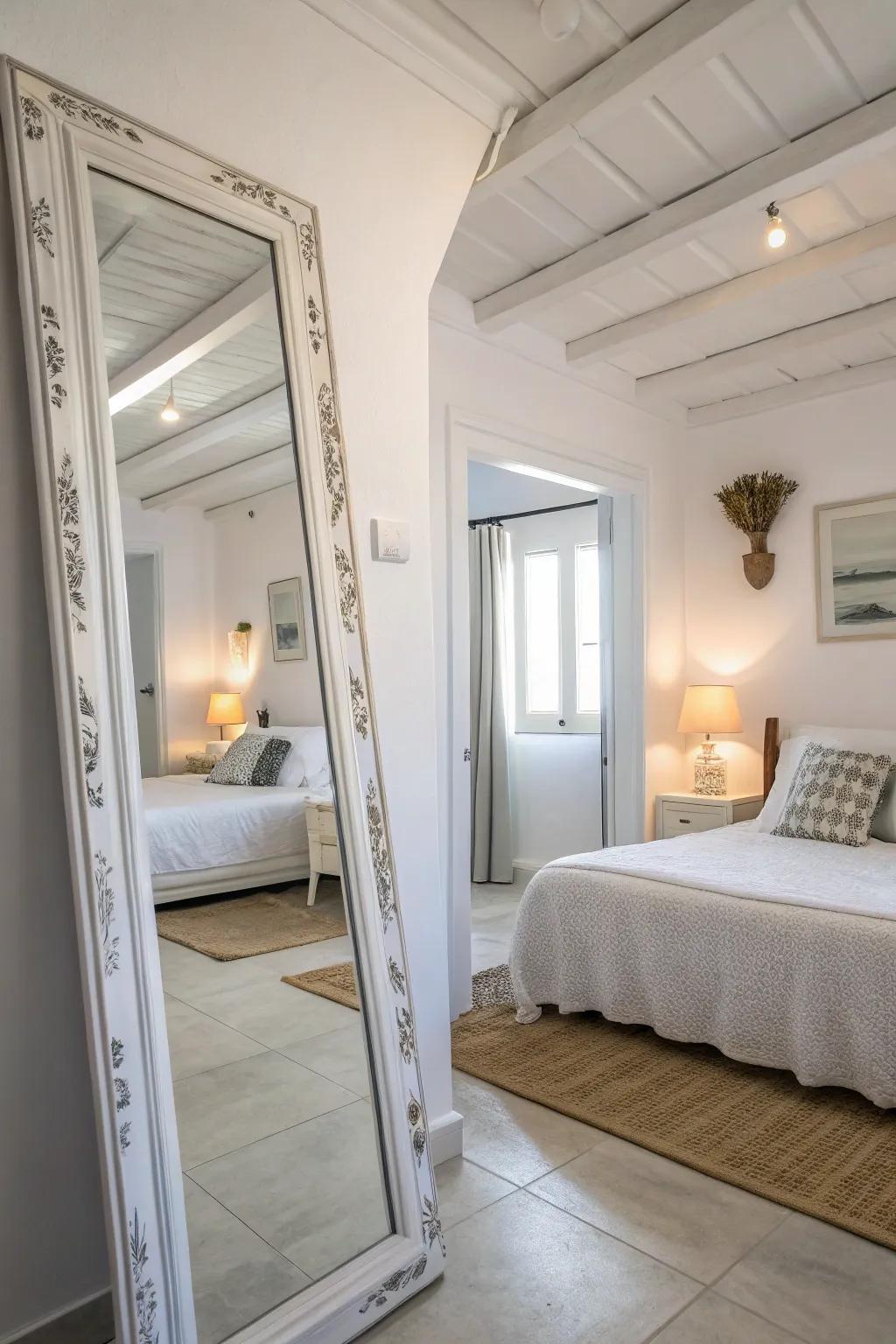 Mirrors in a white bedroom enhance light and space.