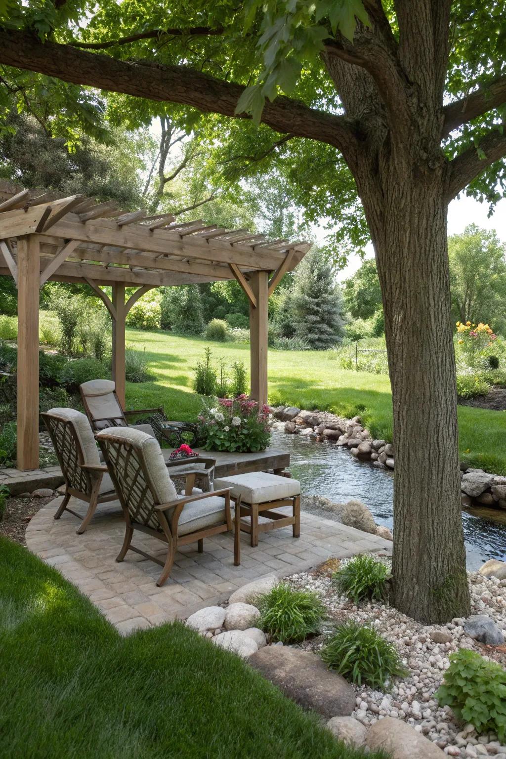 Shaded seating zones offer a cozy getaway in your creekside landscape.