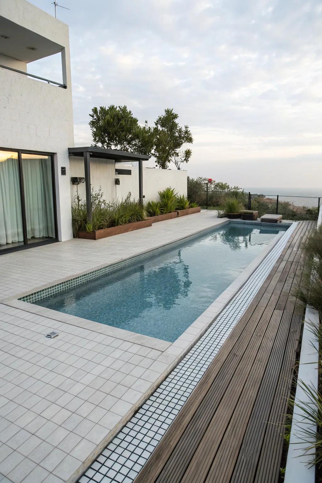 Minimalist tiles offer a sleek and contemporary pool design.