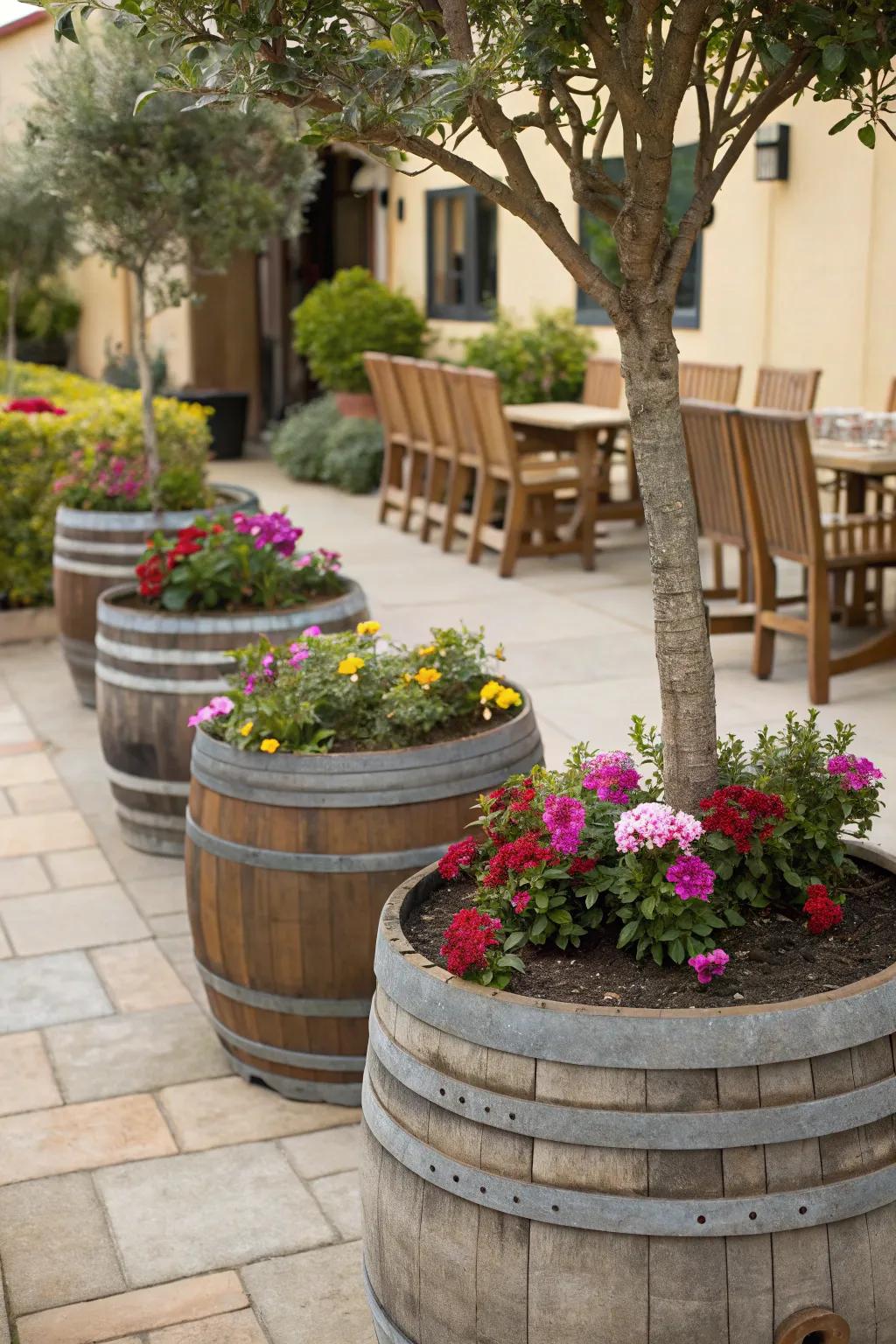 Establish a focal point with repurposed wine cask planters.