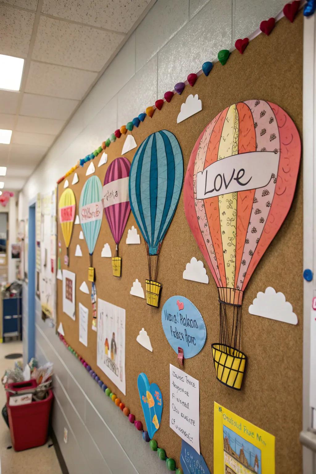 A Love is in the Air bulletin board with hot air balloons and messages.