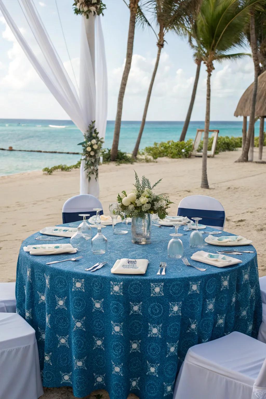 Nautical-themed tablecloth for a serene seaside wedding.